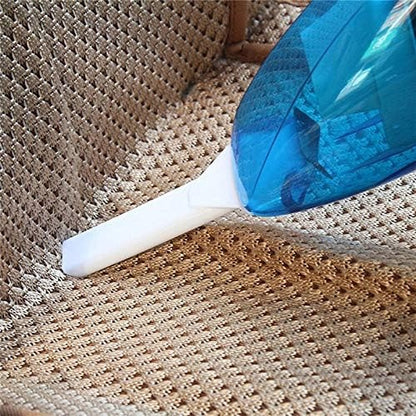 Handy mini car vacuum cleaner being used to clean a textured car seat